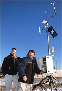 Daryl Herzmann and Raymond Arritt at a weather collection
site