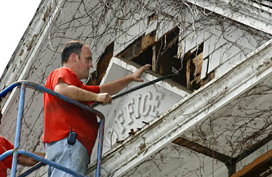 Dan Cretors removing pieces from the EO
Building