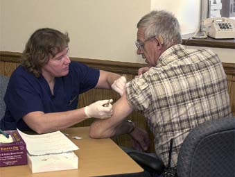 ISU employees receiving free flu shots during the
flu shot clinic