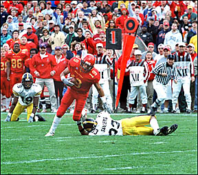 football player escaping a tackle