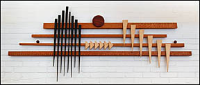 Horizontal pieces of wood (4) with spike pieces of wood on
the left side in a diamond pattern and 6 pieces of spike wood pieces in a
stepping pattern