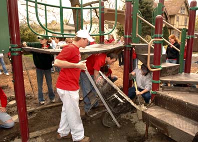 volunteers working on area playgrounds