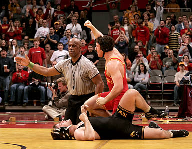 An ISU wrestler pins his opponent