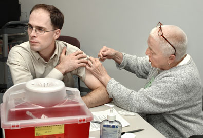 Kevin Houlette receives flu shot
